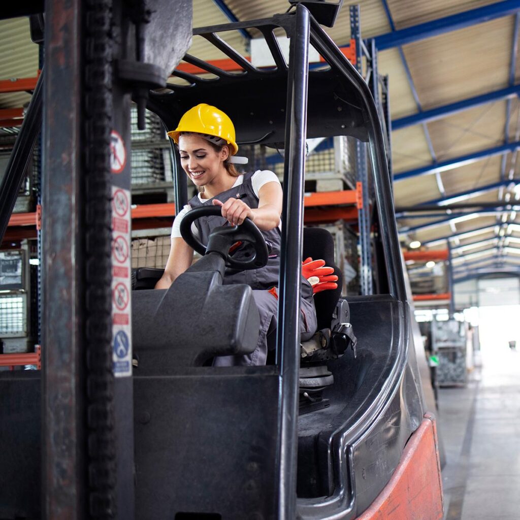 Woman On forklift
